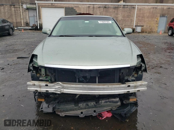 2006 Cadillac DTS 1SC z VIN 1G6KD57Y26U182388, wystawiony jako Copart lot #71929184 z przebiegiem 91 711 mil mil oraz Szkoda całkowita • Salvage title. Historia ofert i sprzedaży dostępna na DreamBid. Obrazek 5.