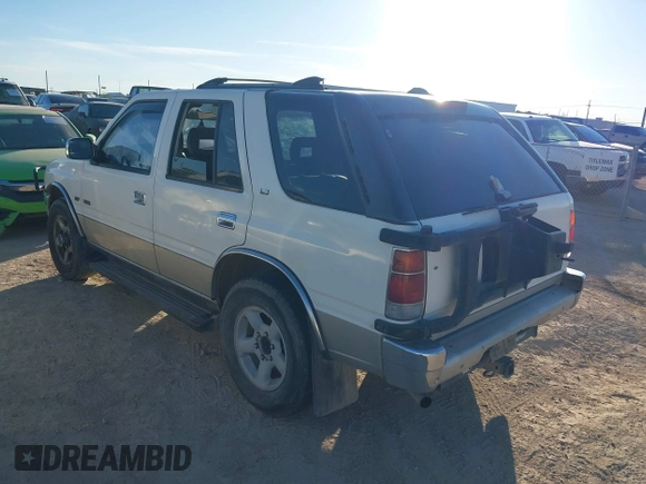 1996 Isuzu Rodeo z VIN 4S2CM58V9T4331093, wystawiony jako IAAI lot #41062073 z przebiegiem 161 833 mil mil oraz . Historia ofert i sprzedaży dostępna na DreamBid. Obrazek 3.