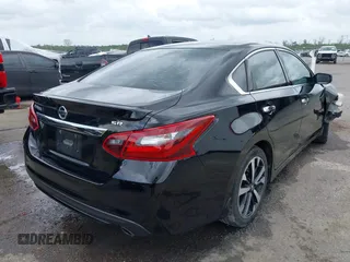 2018 Nissan Altima SR with VIN 1N4AL3AP5JC135313, listed as a IAAI auction lot 41964455 with 86,042 mi miles and . Bid and sale history available at carsss.com. Image 4.