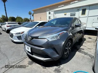 2018 Toyota C-HR XLE with VIN NMTKHMBX1JR004008, listed as a Copart auction lot 61504265 with 106,802 mi miles and Clean title. Bid and sale history available at DreamBid. Image 2.