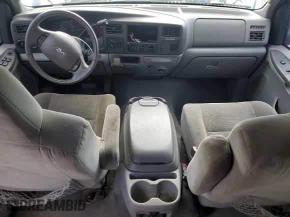 2003 Ford Excursion XLT with VIN 1FMNU41S73EB25176, listed as a Copart auction lot 79601554 with 326,945 mi miles and Salvage Title. Bid and sale history available at DreamBid. Image 8.