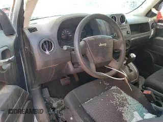 2009 Jeep Patriot Sport z VIN 1J4FT28A59D167643, wystawiony jako Copart lot #49856125 z przebiegiem 186 838 mil mil oraz Szkoda całkowita • Salvage title. Historia ofert i sprzedaży dostępna na DreamBid. Obrazek 8.