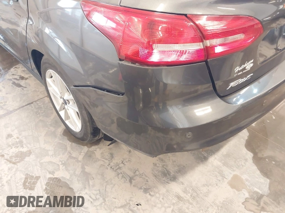 2016 Ford Focus SE with VIN 1FADP3F20GL234077, listed as a IAAI auction lot 41933546 with 106,184 mi miles and . Bid and sale history available at DreamBid. Image 17.
