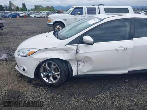 2014 Ford Focus Titanium with VIN 1FADP3J27EL142095, listed as a IAAI auction lot 42004419 with 139,515 mi miles. Bid and sale history available at carsss.com. Image 6.