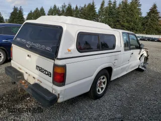 1989 Mazda B-Series Truck z VIN JM2UF3136K0755419, wystawiony jako Copart lot #81501824 z przebiegiem 113 124 mil mil oraz Szkoda całkowita • Salvage title. Historia ofert i sprzedaży dostępna na DreamBid. Obrazek 3.