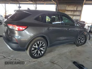 2020 Ford Escape SE Sport Hybrid z VIN 1FMCU9BZ0LUA63674, wystawiony jako Copart lot #59689745 z przebiegiem 157 935 mil mil oraz Szkoda całkowita • Salvage title. Historia ofert i sprzedaży dostępna na DreamBid. Obrazek 3.