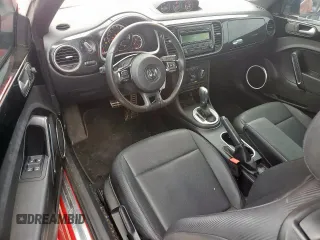 2015 Volkswagen Beetle R-Line z VIN 3VW7T7AT5FM815840, wystawiony jako Copart lot #57490285 z przebiegiem 40 153 mil mil oraz Szkoda całkowita • Salvage title. Historia ofert i sprzedaży dostępna na DreamBid. Obrazek 8.