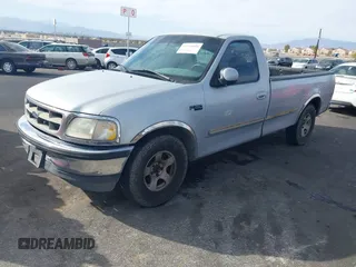 1997 Ford F-150 with VIN 1FTEF17W3VLA19510, listed as a IAAI auction lot 41711010 with 214,984 mi miles and . Bid and sale history available at DreamBid. Image 2.