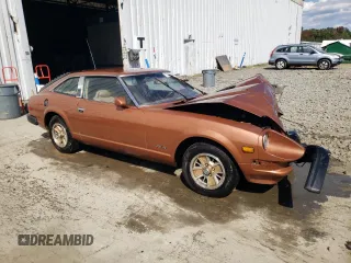 1981 Datsun 280ZX 2+2 z VIN JN1HZ06S6BX193317, wystawiony jako Copart lot #75494384 z przebiegiem 78 678 mil mil oraz Szkody całkowita. Historia ofert i sprzedaży dostępna na DreamBid. Obrazek 4.