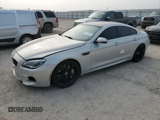 2017 BMW M6 z VIN WBS6E9C56HG437374, wystawiony jako Copart lot #54277624 z przebiegiem 80 858 mil mil oraz . Historia ofert i sprzedaży dostępna na DreamBid. Obrazek 1.