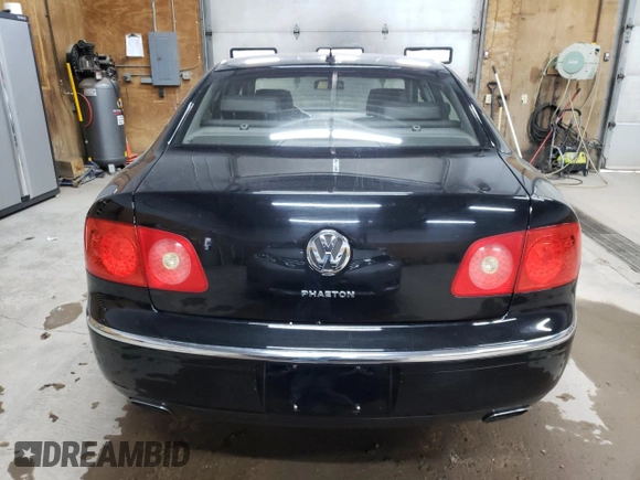 2004 Volkswagen Phaeton V8 z VIN WVWAF63D048011110, wystawiony jako Copart lot #66467834 z przebiegiem 138 229 mil mil oraz Tytuł czysty. Historia ofert i sprzedaży dostępna na DreamBid. Obrazek 6.