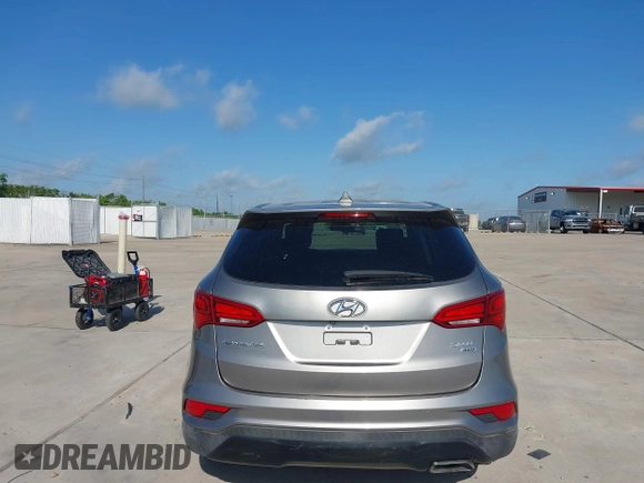 2017 Hyundai Santa Fe 2.4L z VIN 5XYZTDLB7HG444033, wystawiony jako IAAI lot #42263907 z przebiegiem 107 454 mil mil oraz . Historia ofert i sprzedaży dostępna na DreamBid. Obrazek 16.