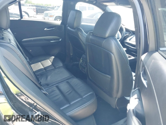2019 Cadillac XT4 FWD Premium Luxury z VIN 1GYFZCR48KF141478, wystawiony jako IAAI lot #41988092 z przebiegiem 53 970 mil mil oraz . Historia ofert i sprzedaży dostępna na DreamBid. Obrazek 8.