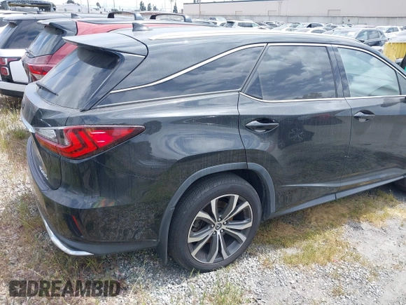 2020 Lexus RX with VIN JTJHZKEA3L2016365, listed as a IAAI auction lot 41615430 with 33,853 mi miles. Bid and sale history available at carsss.com. Image 4.