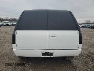1997 GMC Yukon with VIN 3GKEC18R0VG523581, listed as a Copart auction lot 79601454 with 184,548 mi miles and Salvage Title. Bid and sale history available at carsss.com. Image 6.