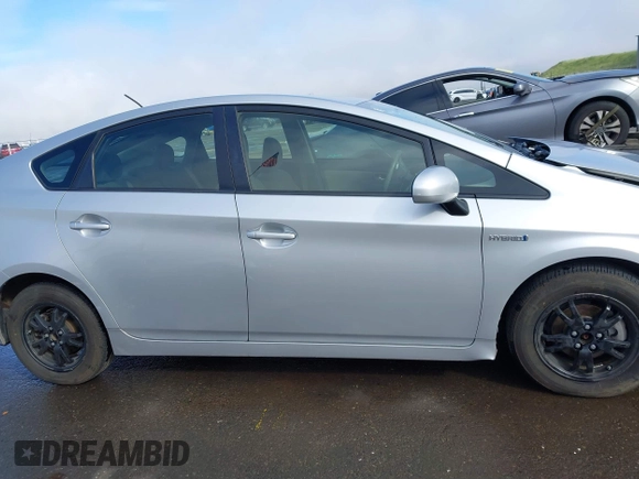 2015 Toyota Prius Four with VIN JTDKN3DUXF0482915, listed as a IAAI auction lot 41827372 with 125,830 mi miles. Bid and sale history available at carsss.com. Image 13.