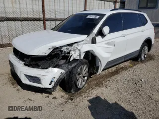 2018 Volkswagen Tiguan S with VIN 3VV1B7AX7JM067181, listed as a Copart auction lot 58402755 with 77,222 mi miles and Salvage title. Bid and sale history available at DreamBid. Image 1.