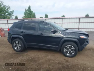 2016 Jeep Cherokee Trailhawk with VIN 1C4PJMBS4GW169267, listed as a IAAI auction lot 42597291 with 79,258 mi miles and . Bid and sale history available at DreamBid. Image 13.