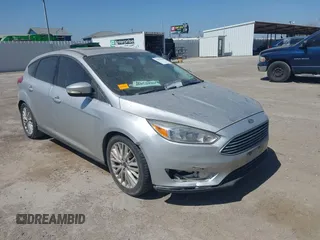 2018 Ford Focus Titanium с VIN 1FADP3N21JL325951, выставлен на аукционе IAAI как лот 41874729 с пробегом 122 000 миль миль и . История ставок и продаж доступна на DreamBid. Изображение 1.