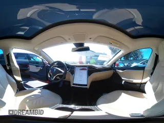 2013 Tesla Model S с VIN 5YJSA1CN1DFP09577, выставлен на аукционе IAAI как лот 41626684 с пробегом 128 289 миль миль и . История ставок и продаж доступна на DreamBid. Изображение 20.