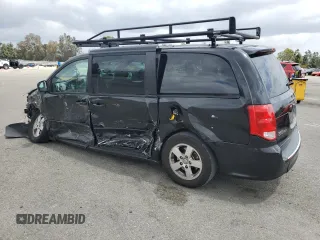 2013 Dodge Grand Caravan SXT with VIN 2C4RDGCGXDR581399, listed as a Copart auction lot 54787935 with 162,970 mi miles and Salvage Title. Bid and sale history available at DreamBid. Image 2.