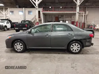 2011 Toyota Corolla L with VIN 2T1BU4EE4BC643260, listed as a IAAI auction lot 41833210 with 218,062 mi miles. Bid and sale history available at carsss.com. Image 14.