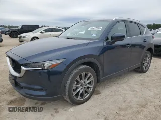2021 Mazda CX-5 Signature with VIN JM3KFBEY9M0343758, listed as a Copart auction lot 46469785 with 41,757 mi miles and Salvage Title. Bid and sale history available at carsss.com. Image 1.