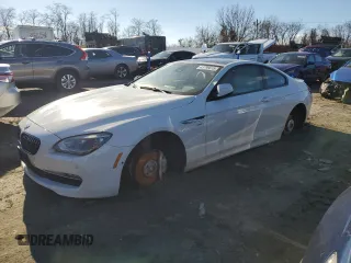 2012 BMW 6 Series 650i xDrive with VIN WBALX5C55CC894302, listed as a Copart auction lot 43796615 with 106,544 mi miles and Salvage Title. Bid and sale history available at carsss.com. Image 1.