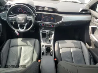 2020 Audi Q3 Premium z VIN WA1AECF33L1008711, wystawiony jako Copart lot #53907995 z przebiegiem 64 411 mil mil oraz Szkoda całkowita • Salvage title. Historia ofert i sprzedaży dostępna na DreamBid. Obrazek 8.