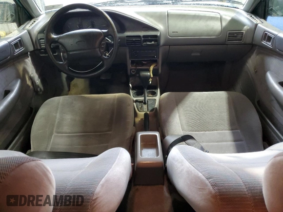 1995 Ford Escort z VIN 3FASP13J7SR205967, wystawiony jako Copart lot #73087444 z przebiegiem 100 401 mil mil oraz Szkoda całkowita • Salvage title. Historia ofert i sprzedaży dostępna na DreamBid. Obrazek 8.