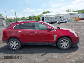 2016 Cadillac SRX Luxury Collection with VIN 3GYFNEE34GS503846, listed as a IAAI auction lot 42211427 with 121,454 mi miles and . Bid and sale history available at DreamBid. Image 13.