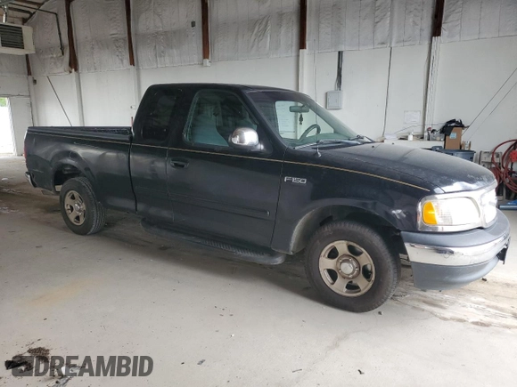 1999 Ford F-150 with VIN 1FTZX1723XNA24144, listed as a Copart auction lot 58071155 with 320,829 mi miles and Salvage title. Bid and sale history available at DreamBid. Image 4.