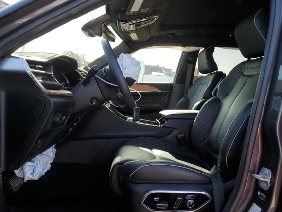 2023 Jeep Grand Cherokee Summit with VIN 1C4RJHEG1P8887273, listed as a Copart auction lot 56213845 with 13,874 mi miles and Salvage title. Bid and sale history available at DreamBid. Image 7.