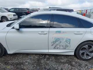 2018 Honda Accord EX with VIN 1HGCV1F40JA048593, listed as a IAAI auction lot 42572510 with 144,604 mi miles and . Bid and sale history available at DreamBid. Image 14.