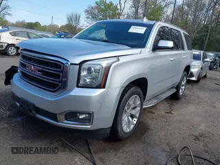 2015 GMC Yukon SLE with VIN 1GKS1AKC8FR540627, listed as a IAAI auction lot 42004023 with 128,195 mi miles. Bid and sale history available at carsss.com. Image 17.
