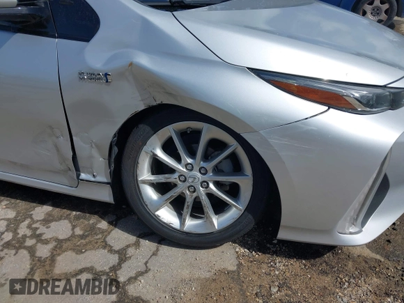 2017 Toyota Prius Plus z VIN JTDKARFP4H3035214, wystawiony jako IAAI lot #41952143 z przebiegiem 166 687 mil mil oraz . Historia ofert i sprzedaży dostępna na DreamBid. Obrazek 17.
