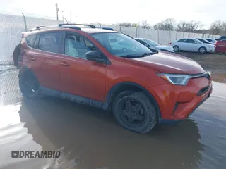 2016 Toyota RAV4 LE with VIN JTMBFREVXGJ081156, listed as a IAAI auction lot 41648303 with 74,087 mi miles. Bid and sale history available at carsss.com. Image 1.