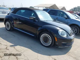2015 Volkswagen Beetle Classic with VIN 3VW517AT7FM812242, listed as a IAAI auction lot 42673317 with 101,683 mi miles and . Bid and sale history available at DreamBid. Image 1.