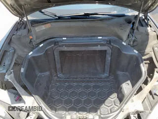 2013 Tesla Model S z VIN 5YJSA1AG1DFP08708, wystawiony jako Copart lot #58403985 z przebiegiem 120 809 mil mil oraz Szkoda całkowita • Salvage title. Historia ofert i sprzedaży dostępna na DreamBid. Obrazek 11.