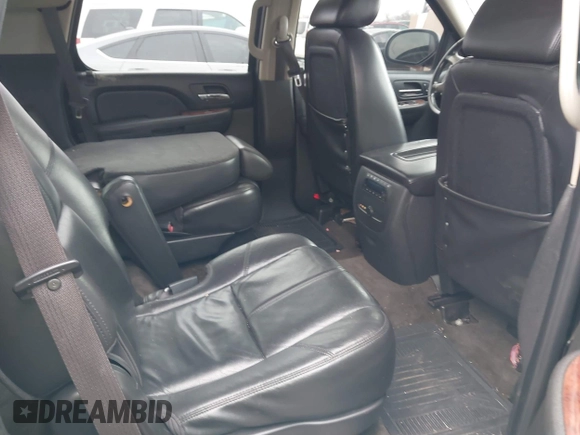 2009 GMC Yukon SLT w/4SA with VIN 1GKFC33J39R295065, listed as a IAAI auction lot 41514132 with 216,680 mi miles. Bid and sale history available at carsss.com. Image 8.