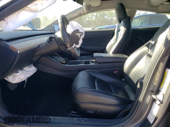 2019 Tesla Model 3 Mid Range with VIN 5YJ3E1EA1KF435295, listed as a Copart auction lot 49552685 with 56,366 mi miles and Salvage Title. Bid and sale history available at DreamBid. Image 7.