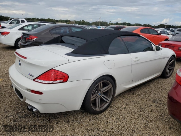 2008 BMW 6 Series M6 z VIN WBSEK93548CY79677, wystawiony jako Copart lot #74154364 z przebiegiem 109 352 mil mil oraz Szkoda całkowita • Salvage title. Historia ofert i sprzedaży dostępna na DreamBid. Obrazek 3.