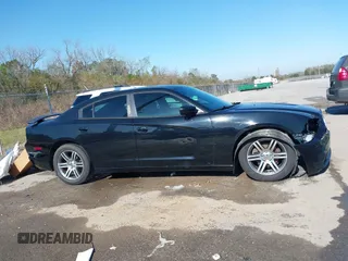 2013 Dodge Charger SE with VIN 2C3CDXBG5DH639694, listed as a IAAI auction lot 41134402 with 159,517 mi miles and . Bid and sale history available at DreamBid. Image 14.