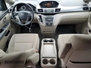 2014 Honda Odyssey LX z VIN 5FNRL5H24EB098072, wystawiony jako Copart lot #57577385 z przebiegiem 215 069 mil mil oraz Szkoda całkowita • Salvage title. Historia ofert i sprzedaży dostępna na DreamBid. Obrazek 8.