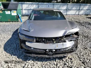 2023 Lucid Air Pure z VIN 50EA1PFA7PA006470, wystawiony jako Copart lot #56476674 z przebiegiem 18 246 mil mil oraz Szkody całkowita. Historia ofert i sprzedaży dostępna na DreamBid. Obrazek 5.
