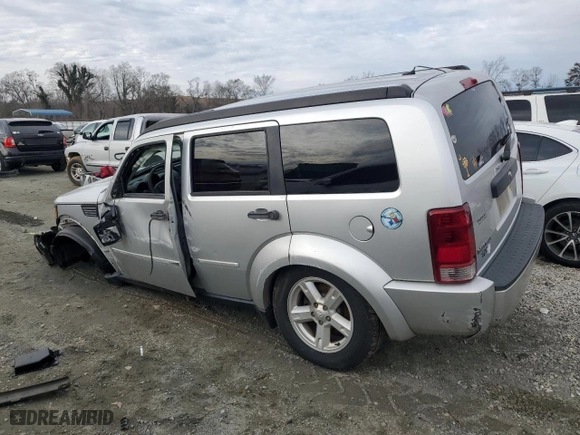 2007 Dodge Nitro SXT with VIN 1D8GT28KX7W739523, listed as a Copart auction lot 43042135 with 251,116 mi miles and Salvage Title. Bid and sale history available at carsss.com. Image 2.
