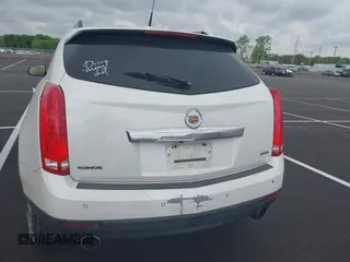 2014 Cadillac SRX Luxury Collection with VIN 3GYFNBE36ES519705, listed as a IAAI auction lot 42069288 with 211,632 mi miles and . Bid and sale history available at carsss.com. Image 16.