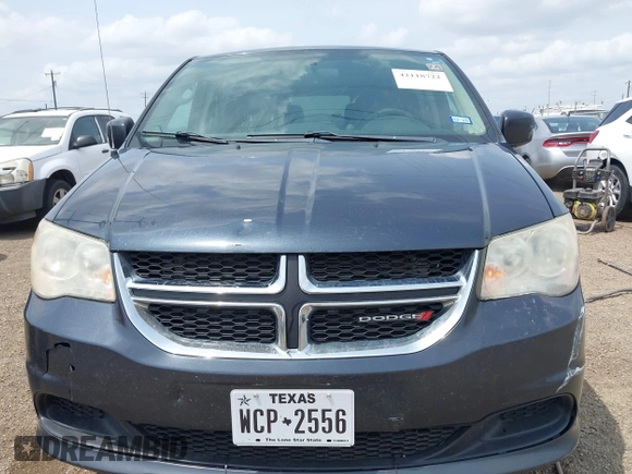 2013 Dodge Grand Caravan SXT with VIN 2C4RDGCGXDR749803, listed as a IAAI auction lot 42118722 with 264,454 mi miles and . Bid and sale history available at DreamBid. Image 12.