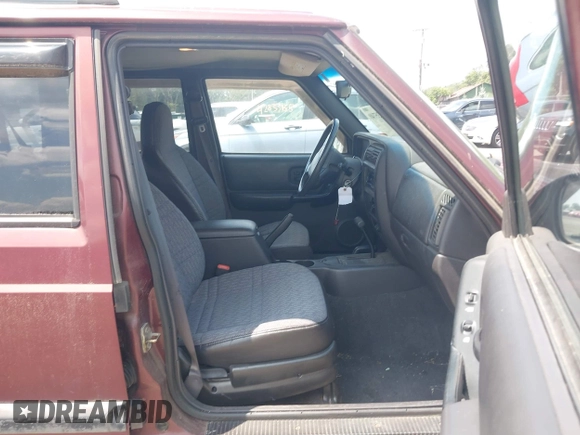 2000 Jeep Cherokee z VIN 1J4FF48S1YL256206, wystawiony jako IAAI lot #42835740 z przebiegiem 131 864 mil mil oraz . Historia ofert i sprzedaży dostępna na DreamBid. Obrazek 5.