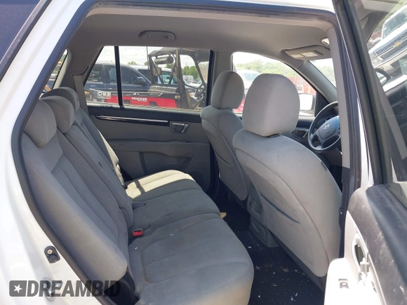 2009 Hyundai Santa Fe GLS z VIN 5NMSG73D79H296014, wystawiony jako IAAI lot #42374973 z przebiegiem 173 578 mil mil oraz . Historia ofert i sprzedaży dostępna na DreamBid. Obrazek 8.